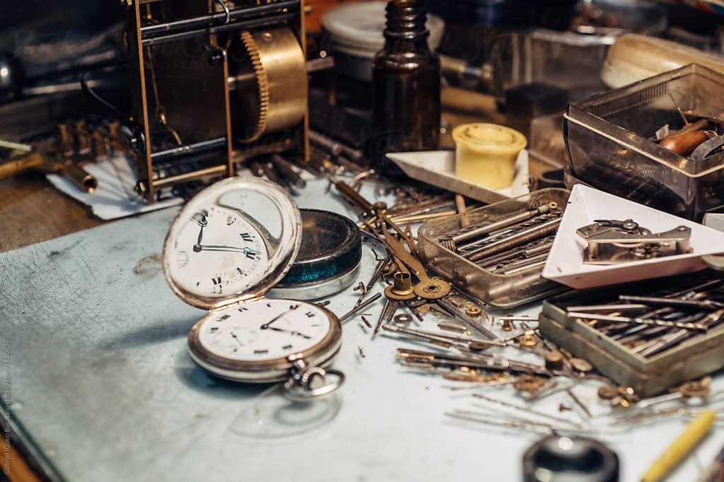The clock on watchmaker's table